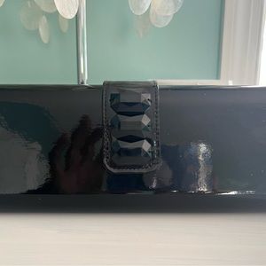 Paten leather black clutch